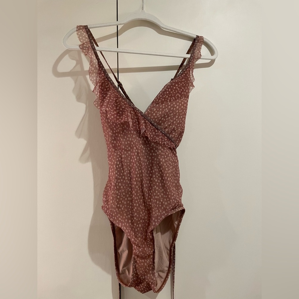 Ella Moss large polk a dot criss cross back one piece swimsuit.